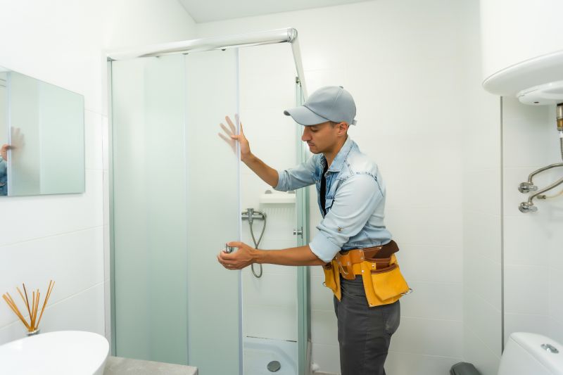 Expert installing shower components